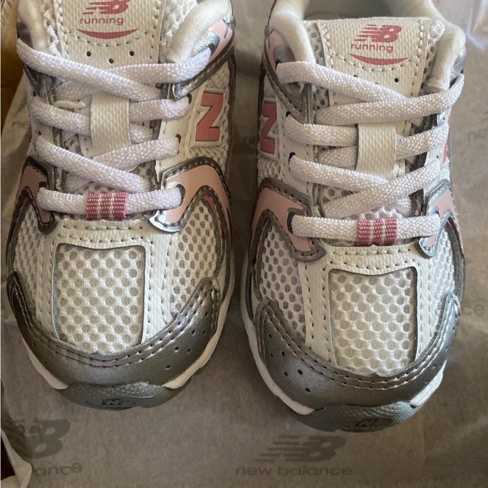 New Balance Kids White & Pink Sneakers with Silver Accents size 6US